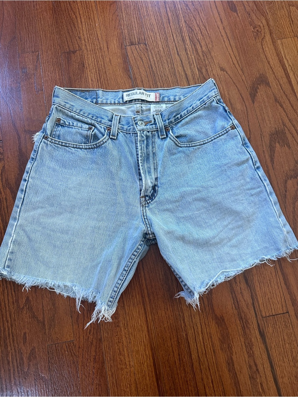 Vintage Levi's Light Blue Frayed Hem Denim Cutoff Shorts